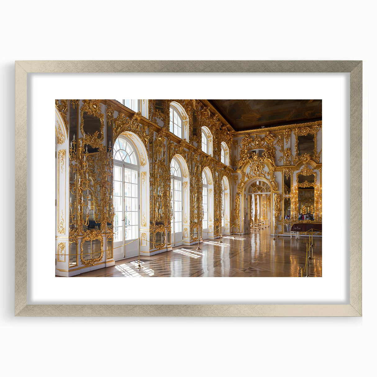 Abstract art print of a palace design in muted gold and beige tones, framed in silver, ideal for dining room decor.
