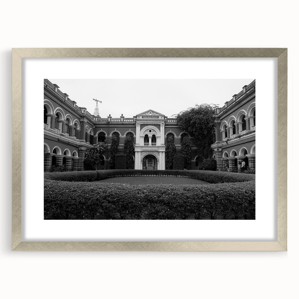 Abstract art print of a palace design in muted gray and blue tones, framed in silver, ideal for dining room decor.