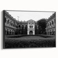 Black and white wall art featuring a vintage poster-style landscape of a palace, printed on framed canvas.