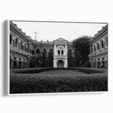 Framed canvas featuring a vintage poster of a palace in black and white tones, ideal for bedroom wall art.