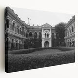 Side view of a large stretched canvas featuring a detailed palace architecture design in neutral tones.
