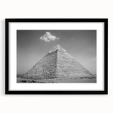 Extra large abstract art print featuring colorful, textured pyramids on a black framed canvas, ideal for living room decor.