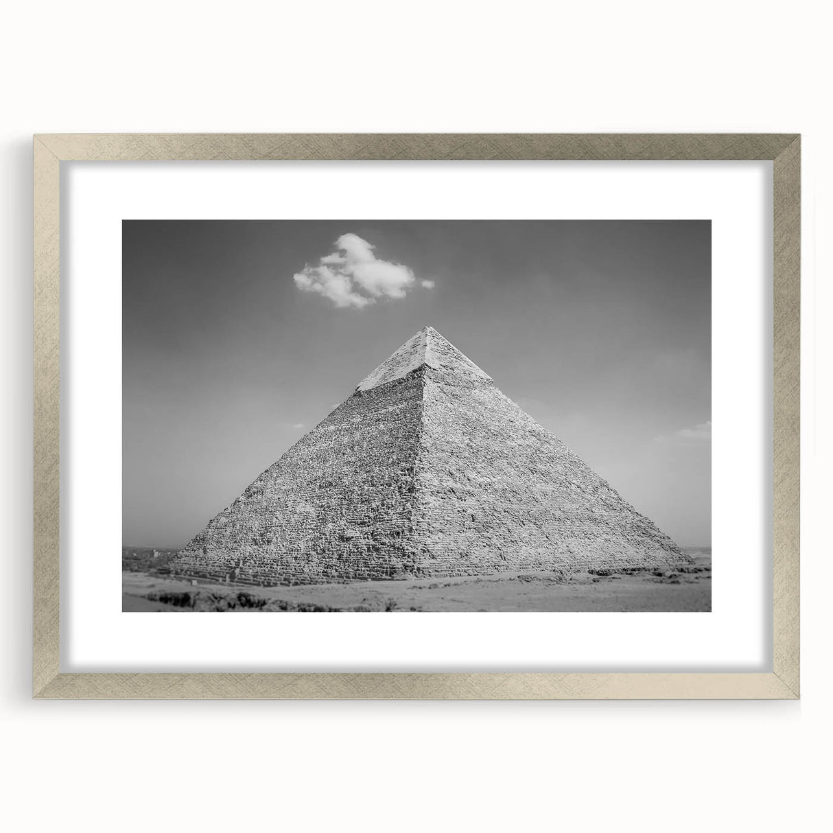 Abstract art print of geometric pyramids in silver frame, ideal for modern dining room decor.