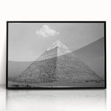 Large abstract wall art depicting geometric pyramids in black and gray tones on a framed acrylic.