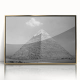 Mid-century modernist art of pyramids in gold and black tones, acrylic print framed, suitable for modern art wall decor.