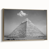 Framed canvas depicting a vintage poster of colorful pyramids, ideal for adding a touch of history to any room.