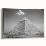 Vintage poster art of pyramids in muted black with colorful accents on a large framed canvas, suitable for living room decor.