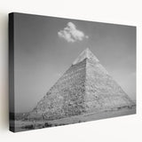 Graphic print of pyramids in muted beige and ivory tones on stretched canvas, suitable for kitchen wall art.
