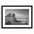 Abstract art print of colorful, textured pyramids on a large canvas, ideal for living room decor.