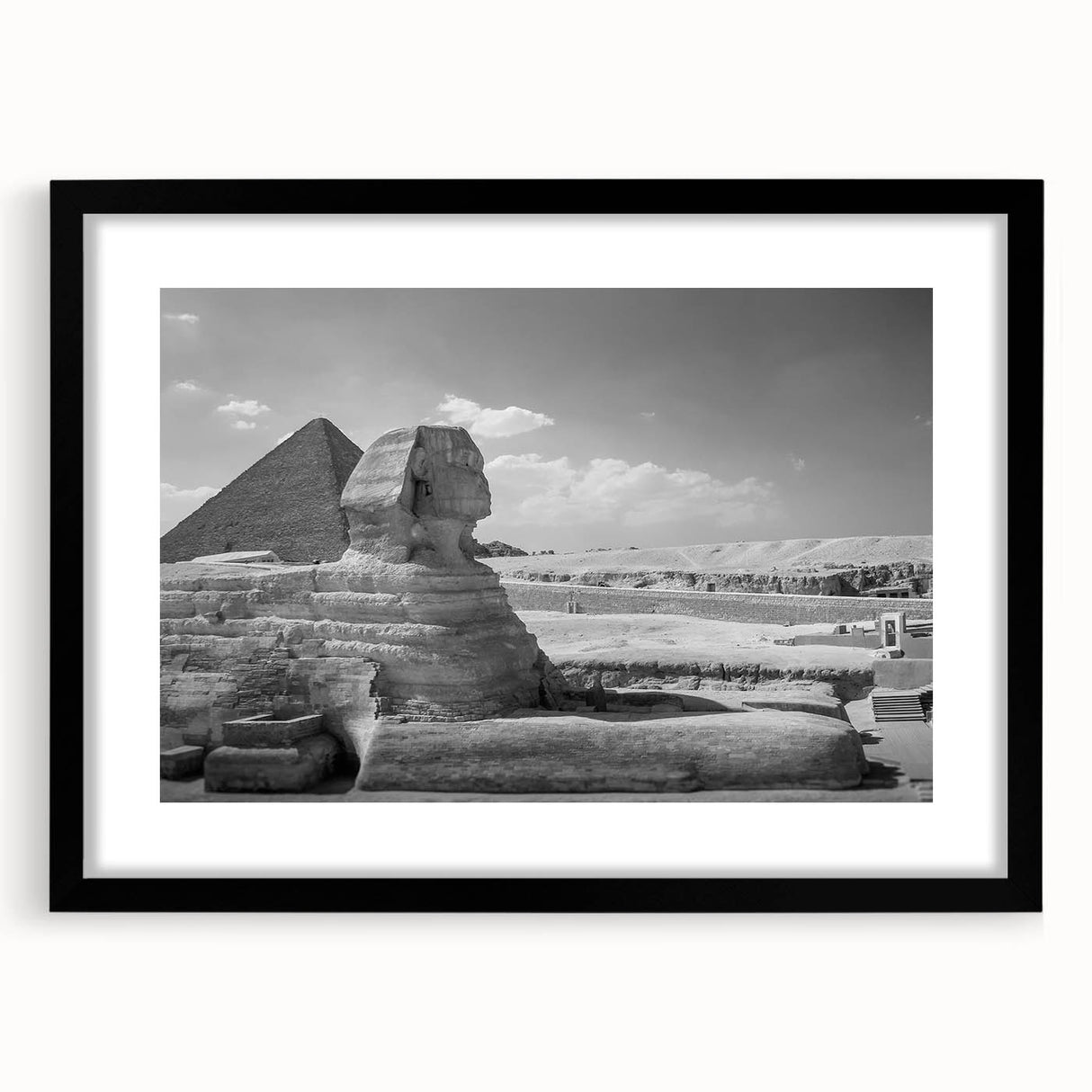 Abstract art print of colorful, textured pyramids on a large canvas, ideal for living room decor.