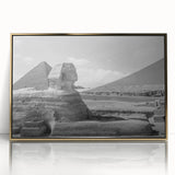 Mid-century modernist art of geometric pyramids in gold and black tones on acrylic, ideal for nursery wall art.