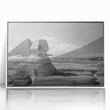 Mid-century modernist pyramid design in muted earth tones on a large framed acrylic, suitable for modern art wall decor.