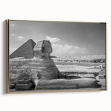 Framed canvas of a vintage poster featuring colorful landscape art paintings of pyramids, ideal for an office or study.