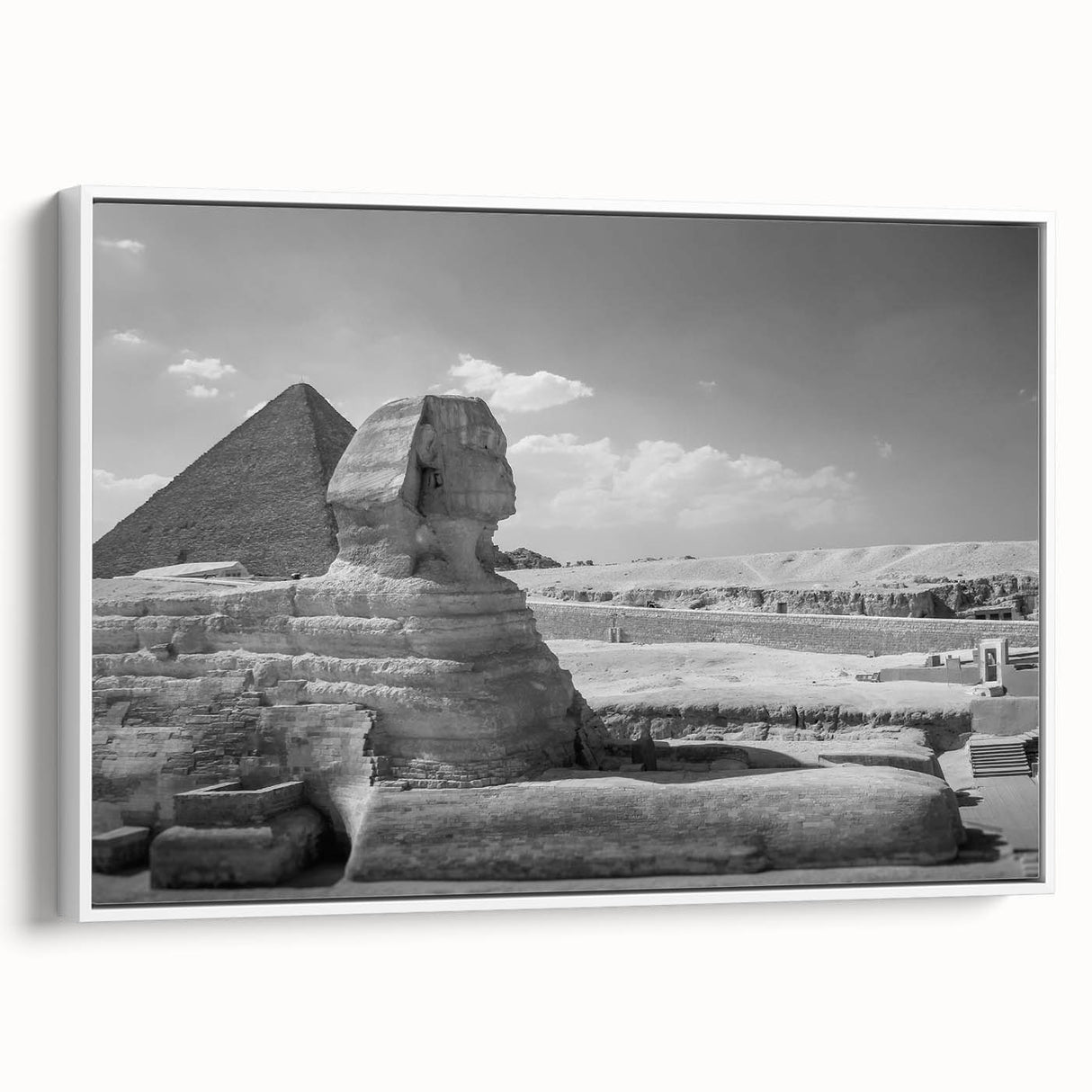 Framed canvas depicting a vintage-style pyramid landscape in black and white, ideal for bedroom wall art.