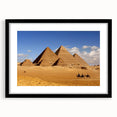 Extra large abstract art print featuring colorful textured pyramids, framed in black, ideal for living room decor.