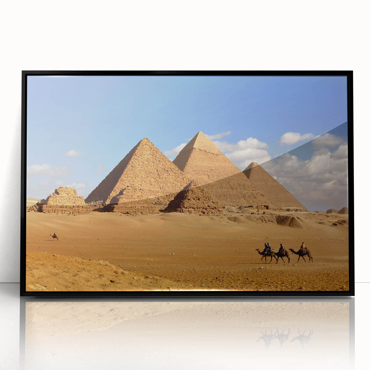 Large abstract wall art featuring geometric pyramids in black and white, framed acrylic print.