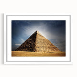 Extra large abstract art print of pyramids in muted earth tones on a textured canvas, ideal for living room decor.