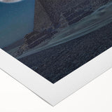 Art deco poster featuring geometric pyramids in muted gold and black on rolled canvas, suitable for dining room decor.