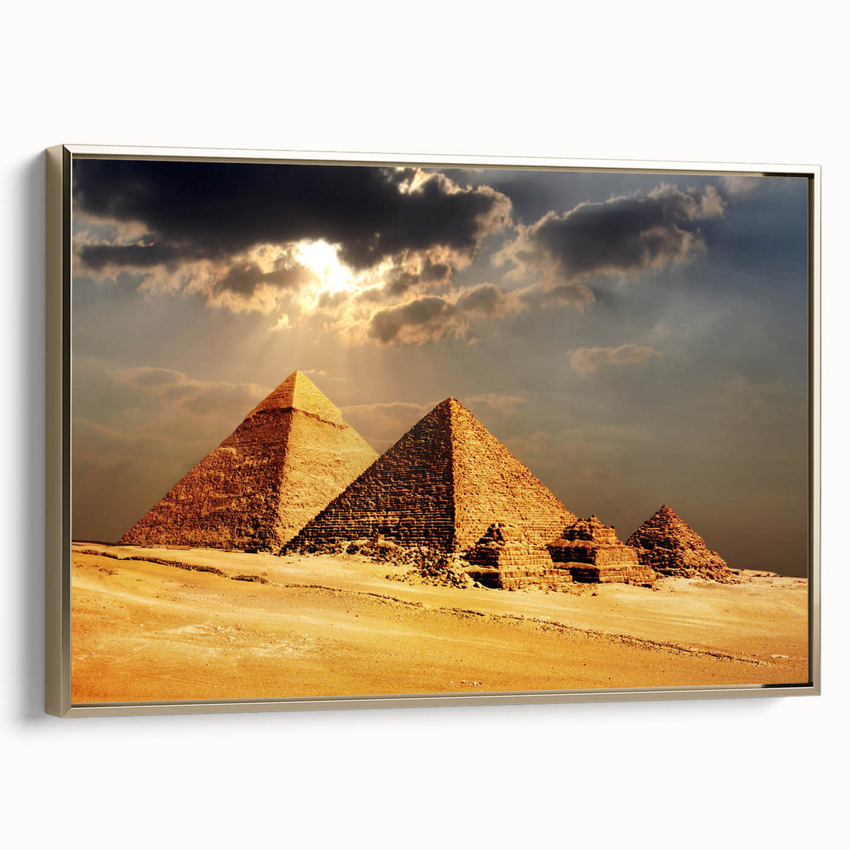 Framed canvas featuring a vintage poster of colorful landscape art paintings with pyramids, in gold and black tones.