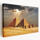 Graphic print of pyramids in earthy tones on a stretched canvas, suitable for kitchen wall art.