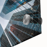 Mid-century modernist large abstract wall art depicting skyscrapers in muted gray tones on acrylic glass.