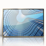 Mid-century modernist art depicting skyscrapers, in gold and black tones on a framed acrylic print.