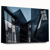 Large abstract wall art depicting a skyscraper in muted gray and blue tones on acrylic glass.