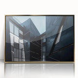 Mid-century modernist art of a skyscraper in gold and black tones on a framed acrylic, suitable for modern art wall decor.