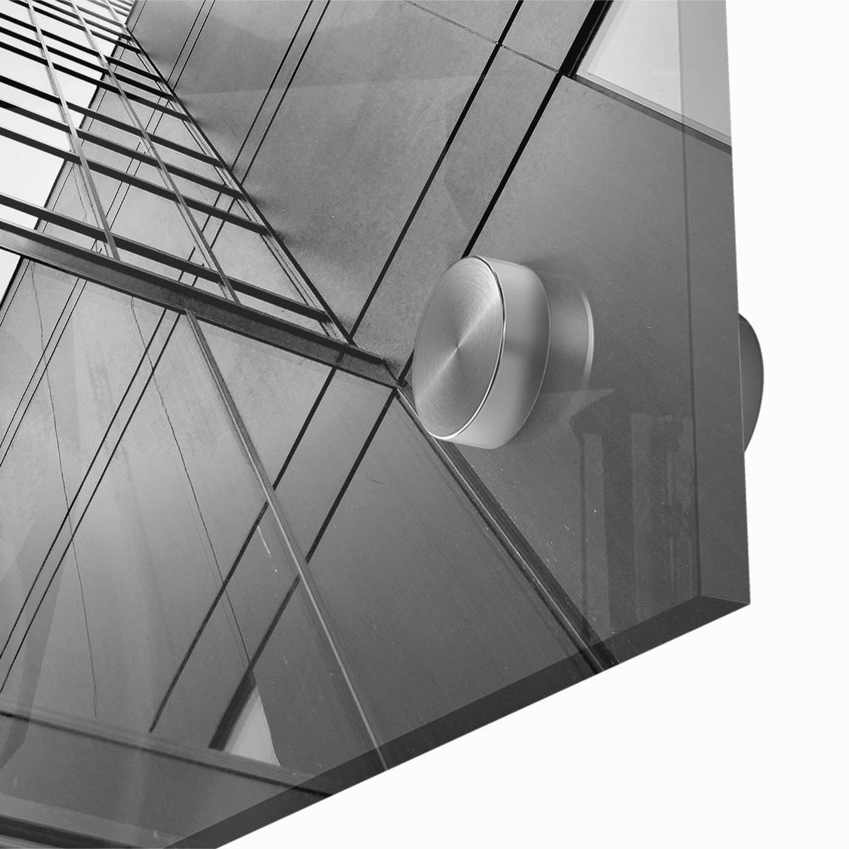 Mid-century modernist large abstract wall art of a skyscraper design in muted gray tones on acrylic glass.