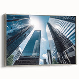 Vintage poster art of a skyscraper, in black and silver tones on a framed canvas, suitable for living room decor.