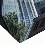 Black and white photo of skyscrapers on stretched canvas, ideal for bedroom wall art.