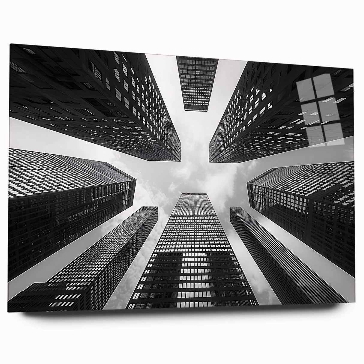 Large abstract wall art on acrylic glass depicting a skyscraper design in shades of gray.