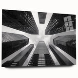 Large abstract wall art on acrylic glass depicting a skyscraper design in shades of gray.
