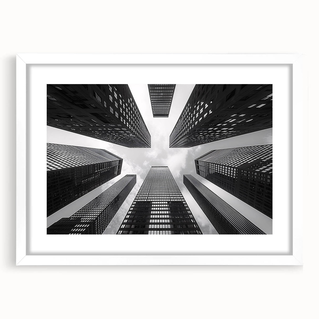 Extra large abstract art print of skyscrapers in muted gray tones on a white framed canvas, suitable for living room decor.