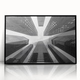 Large abstract wall art depicting a skyscraper in black and white tones on a framed acrylic.