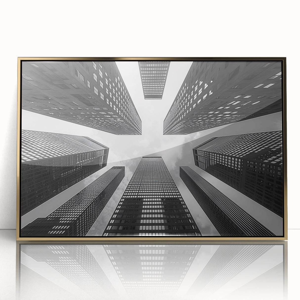 Mid-century modernist art of a skyscraper design in gold and black framed acrylic, suitable for modern art wall decor.