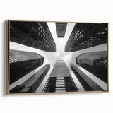 Framed canvas of a vintage skyscraper design in black with colorful accents, suitable for office or study decor.