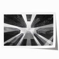 Minimalist skyscraper design on a rolled print, in muted gray tones, suitable for art wall dining room.