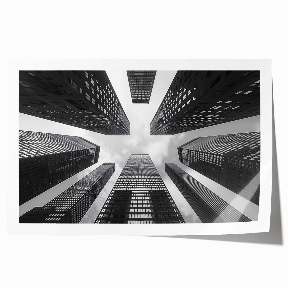 Minimalist skyscraper design on a rolled print, in muted gray tones, suitable for art wall dining room.