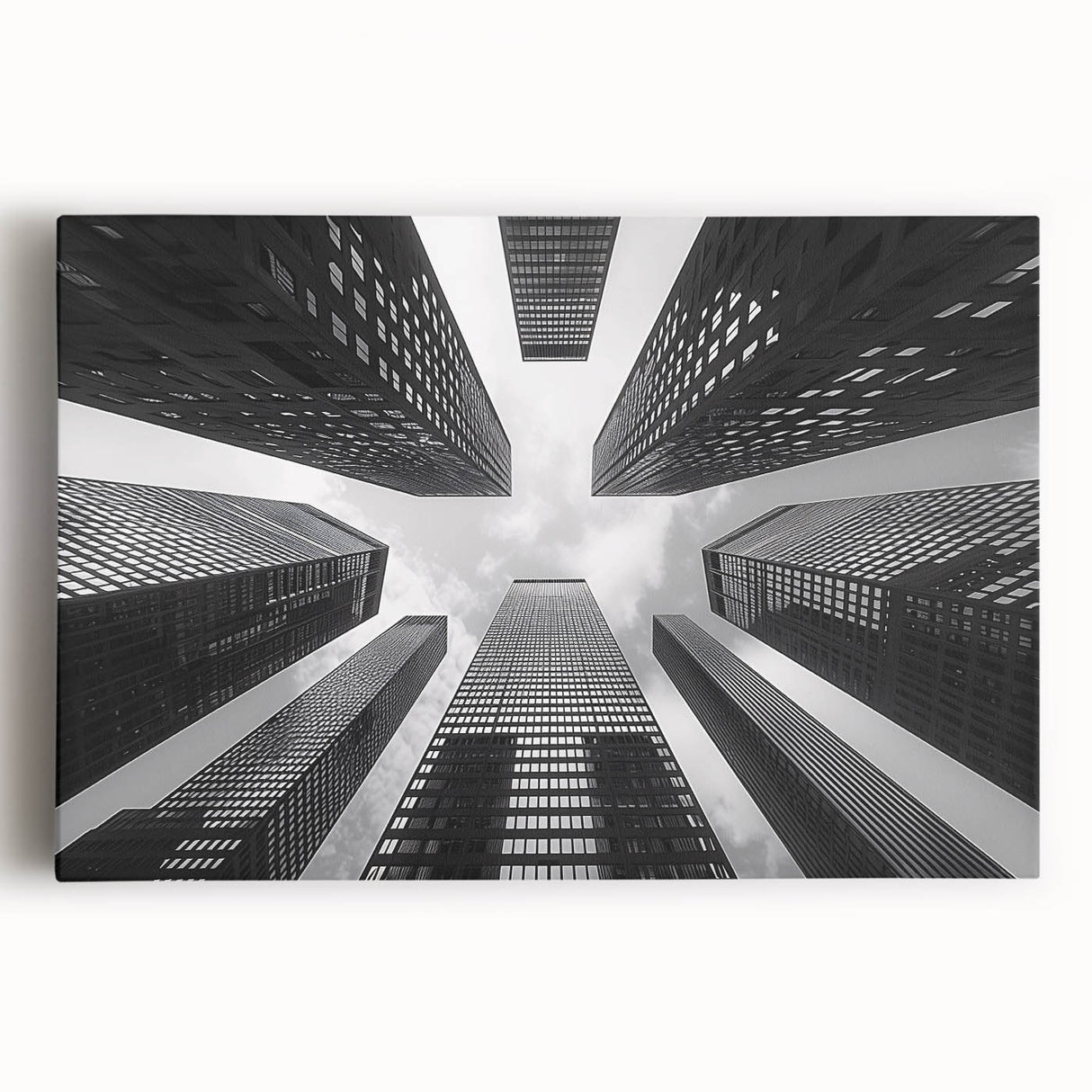 Black and white photo of a skyscraper on stretched canvas, suitable for kitchen wall art.