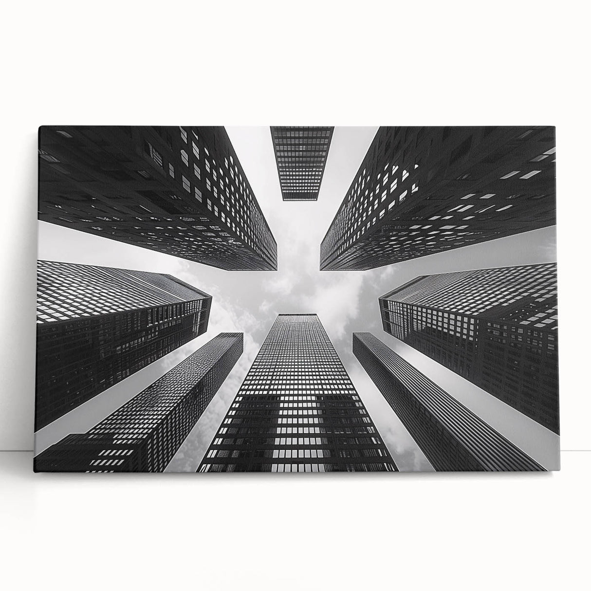 Black and white photo of skyscrapers on stretched canvas, ideal for kitchen wall art or bedroom.