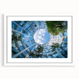 Extra large abstract art print of skyscrapers, in muted gray and blue tones on a white framed canvas.