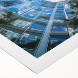 Art deco poster of a skyscraper, using muted metallic tones on a rolled canvas, suitable for dining room decor.