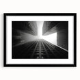 Extra large abstract art print of colorful skyscrapers on a textured canvas, framed in black, suitable for living room decor.