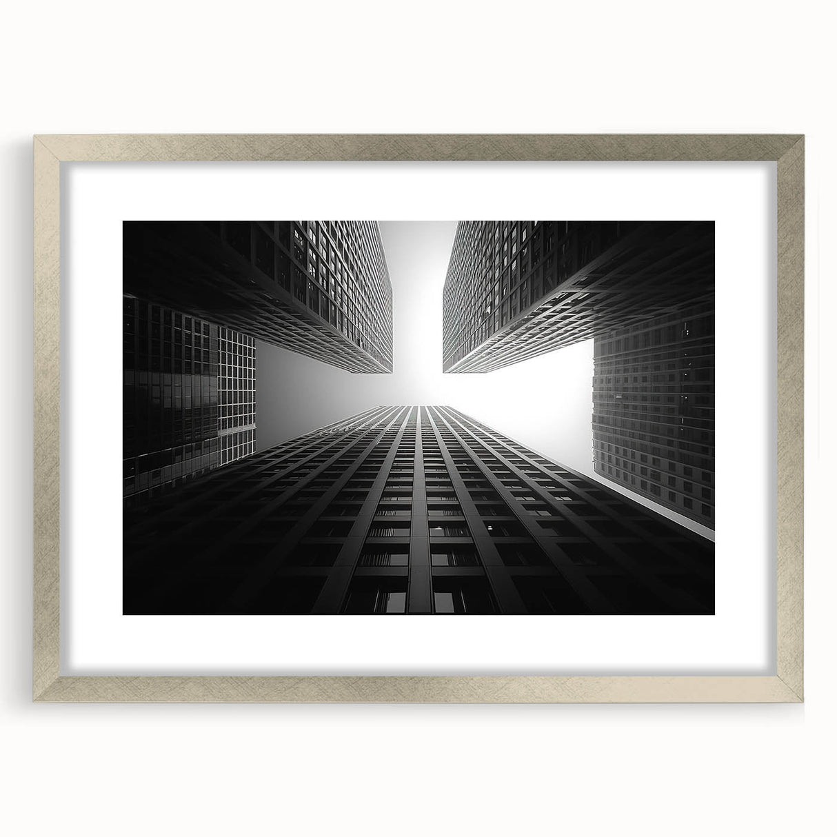 Abstract art print of a geometric skyscraper design in silver frame, ideal for modern dining room decor.