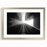 Abstract art print of a geometric skyscraper design in silver frame, ideal for modern dining room decor.