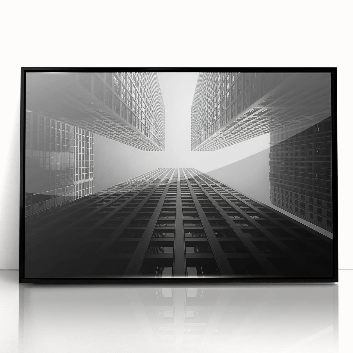 Large abstract wall art featuring a black and white skyscraper design on an acrylic print, suitable for modern office decor.
