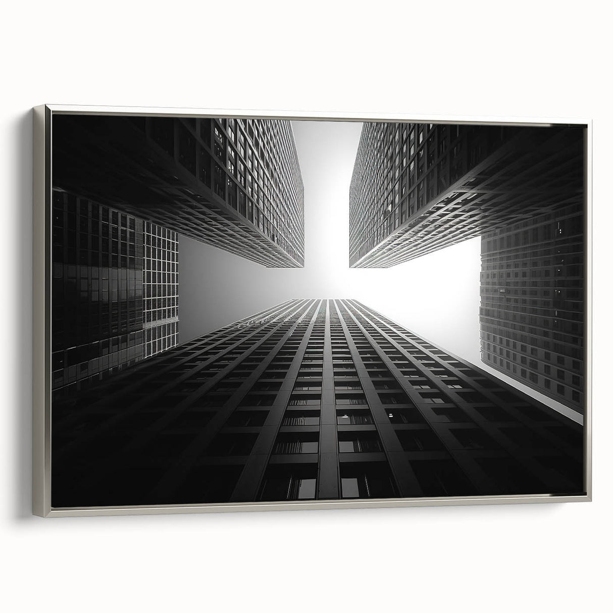 Vintage poster art of a skyscraper, featuring a monochrome palette with silver highlights, framed canvas.