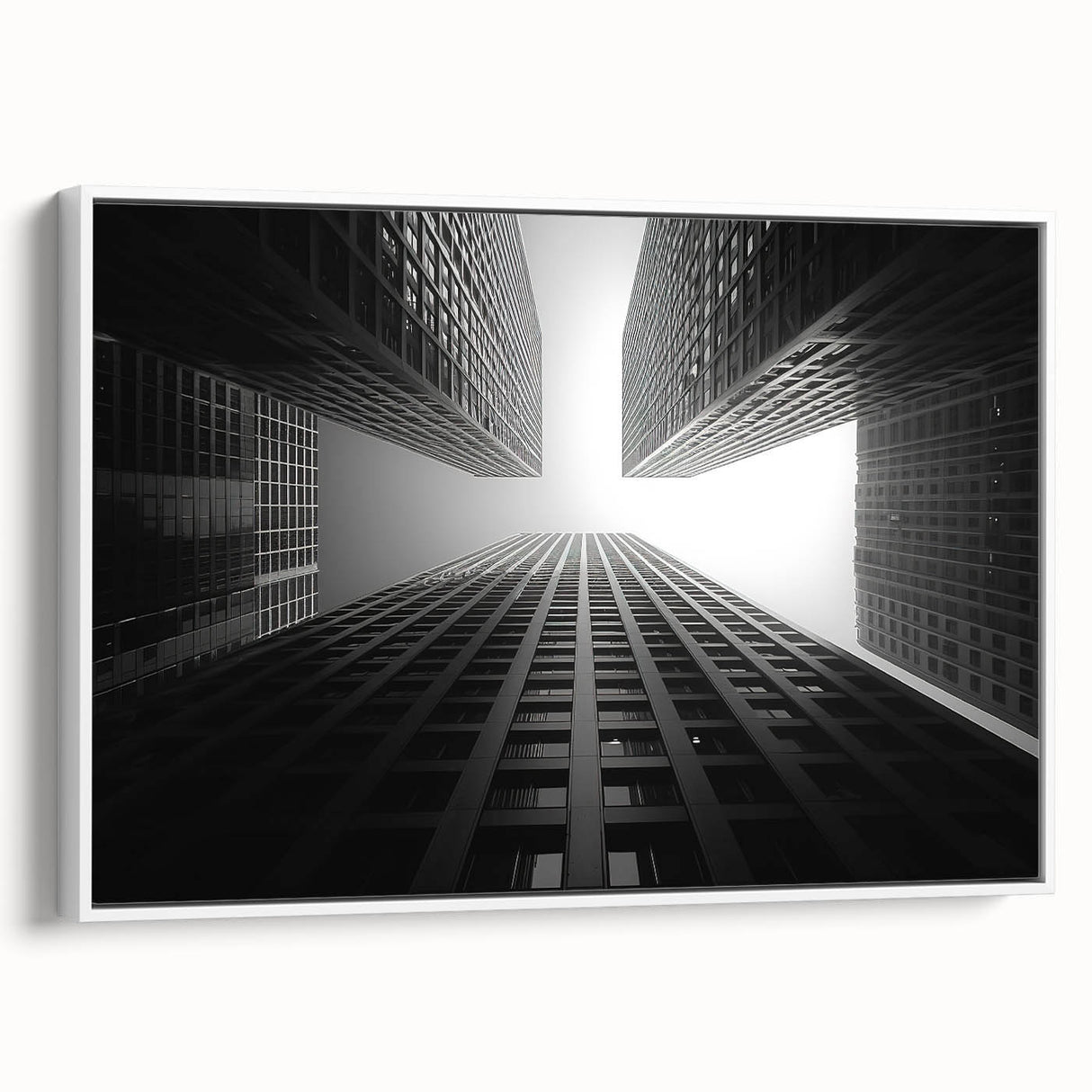 Framed canvas featuring a monochrome vintage poster of a skyscraper, ideal for bedroom wall art.