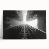 Black and white photo of a skyscraper on stretched canvas, ideal for kitchen wall art or bedroom ambiance.